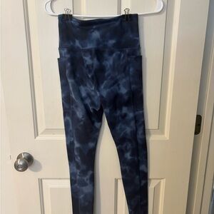 These are tie dye blue leggings. Never worn